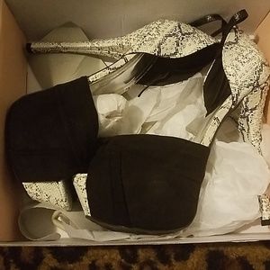 Barely worn Black seude with beaded heels